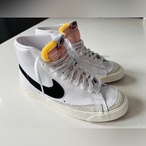 Nike Women's Blazer Mid 77 White and Black Sneakers with Yellow Accents